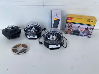 three different types of lights are sitting on a table