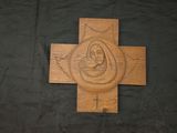 an image of a wooden cross with an image of jesus on it