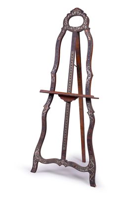 a wooden easel with a mirror on top of it