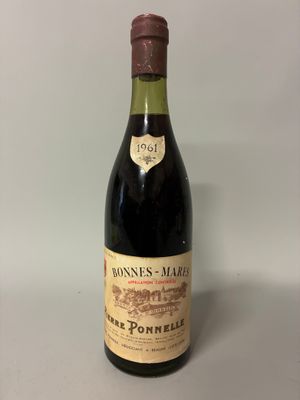 a bottle of wine that is sitting on a table