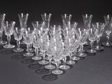 a lot of empty wine glasses on the table