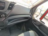 a dashboard of a car with a steering control