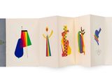 an open book with a picture of different colored ties on it