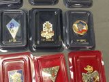 a lot of badges and badges on a table