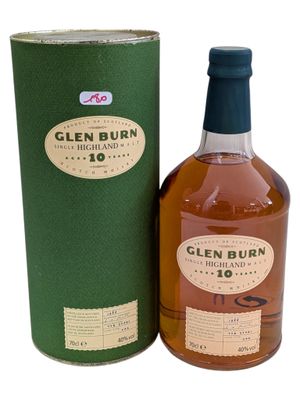 a bottle of glen burn 10 year old whisky next to a green box