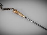an image of a wooden stick with a chain on it