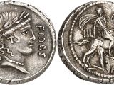 a silver coin with an image of a man riding a horse