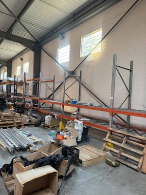 a large warehouse filled with lots of boxes and pallets