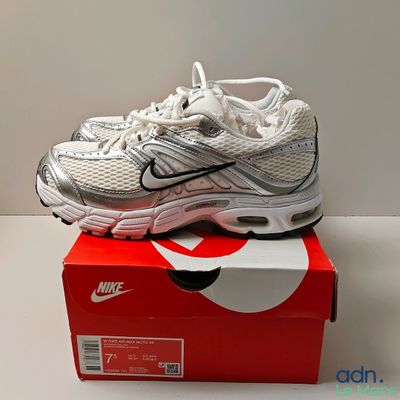 nike air max running shoes in a box on a white surface