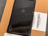 a close up of a box with a cell phone on it