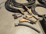 a lot of hoses that are laying on the floor