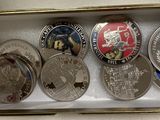 a box of coins that are in the shape of a coin