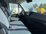 a view of the inside of a van from the driver ' s seat
