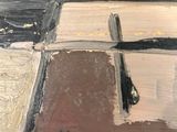 an image of a painting of a cross on a table