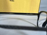 a close up of a pair of glasses on a table