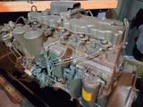 a very old engine that is on display in a museum