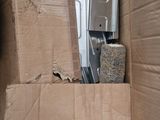 a cardboard box that is sitting in the back of a truck