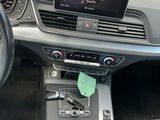 a car dashboard with a steering wheel and a dash board
