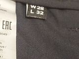 a label on the back of a black shirt