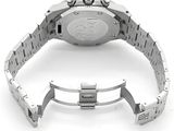 an image of a close up of a wrist watch on a white surface