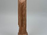 an image of a statue of a woman holding a baby