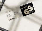 a picture of a card sitting on top of a metal rack