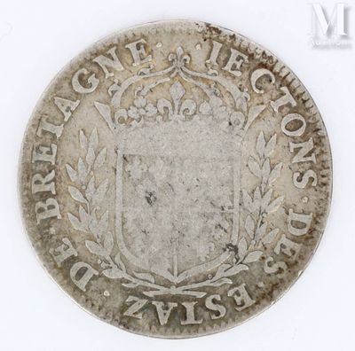 a close up of a coin on a white surface with a white background