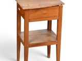 an image of a small wooden table with a drawer underneath it