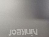 a close up of a laptop with the logo on it