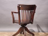 an image of a wooden chair sitting on top of a hard wood floor
