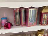 a shelf that has a lot of different items on it