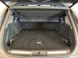 a trunk of a car with the doors open