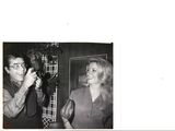 a black and white photo of a man and a woman