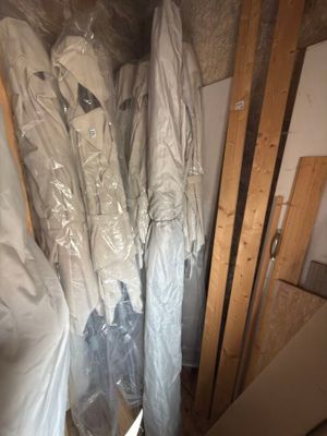 a room that has a bunch of clothes in it