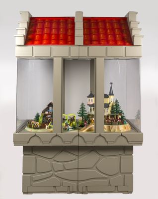 un petit bâtiment avec un toit rouge et un toit rouge