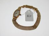 an image of a wrist watch with a price tag attached to it