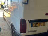 a white van that is parked in a garage