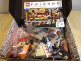 a box full of legos sitting on a table