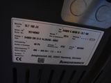 a close up of a bus ticket on the back of a bus