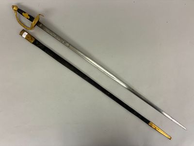 two swords with gold and black handles on a white surface