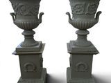 two vases that are sitting on top of each other
