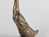 bronze statue of a duck on a white background