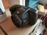 a camera that is sitting on top of a box