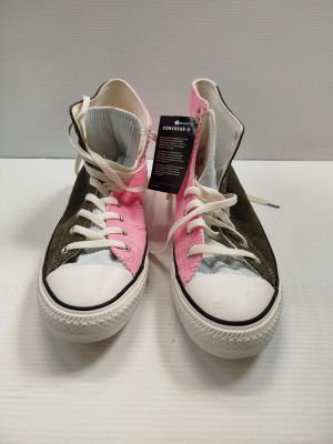 pair of pink and white converses on a white surface