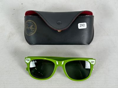 a pair of sunglasses and a case on a table