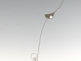 statue of a man flying a kite on a white surface