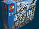 a box with a lego city set inside of it