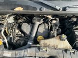 a picture of a car engine with its hood open