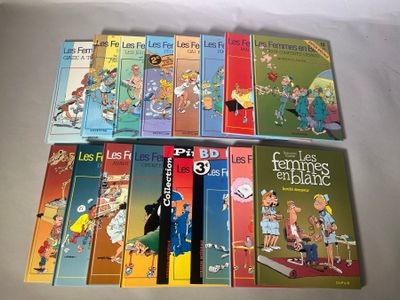 plusieurs livres pour enfants sont alignés sur une surface blanche