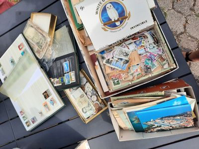 a box full of stamps sitting on top of a table